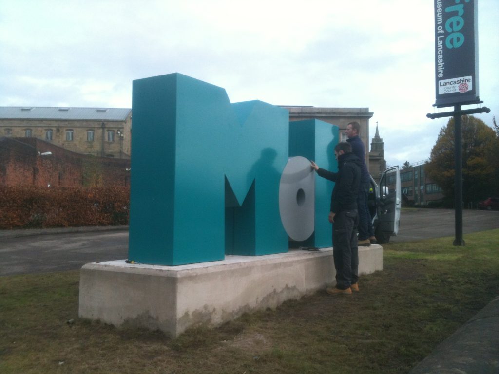 Built up metal letters installation